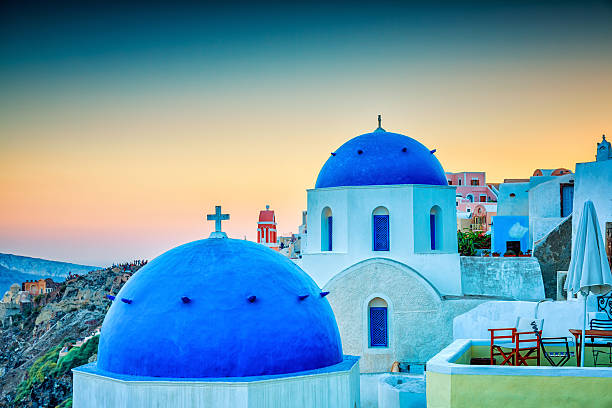 istock Santorini Oia village at sunset 495758235