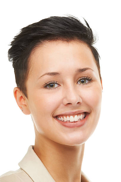 hellen lächeln und große pläne - toothy smile isolated on white 20s young women stock-fotos und bilder