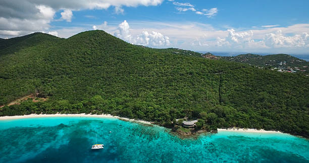 aerial view of beaches at Honeymoon and Salomon Bays, St.John aerial view of white sand beaches at Honeymoon Bay and Salomon Bay, St.John, US Virgin Islands honeymoon bay stock pictures, royalty-free photos & images