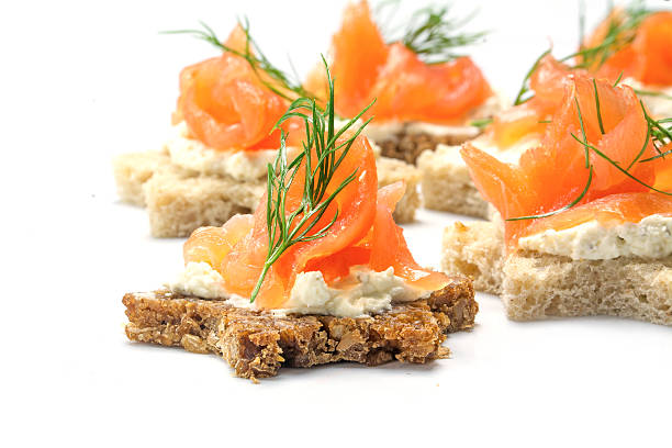 istock canapes in star shape with salmon isolated on white 495759528