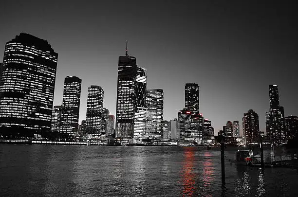 Night skyline in black and white with single red colour