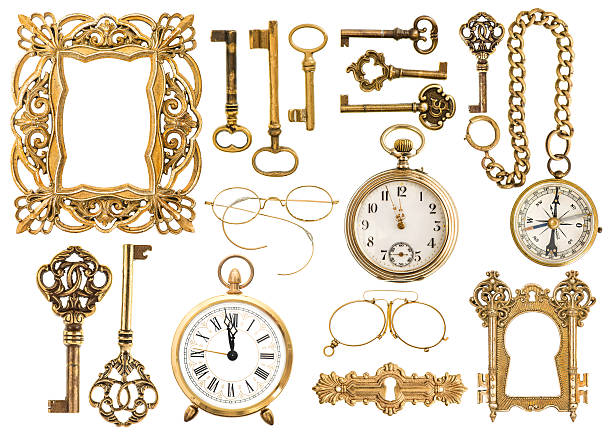 istock Antique golden accessories. Vintage picture frame clock key 495759972