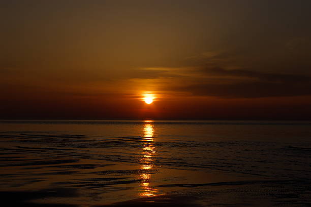 istock Beautiful orange blue sunset at Baltic sea 495761207