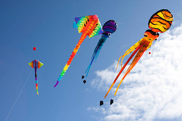 istock Colorful kites against a blue sky 495761738