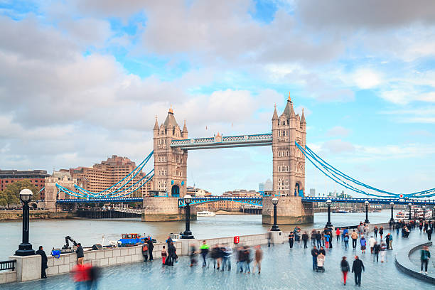 istock London - Tower Bridge and Thames with pedestrians 495761943