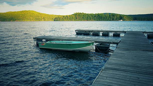 istock Adirondack Mountains, Schroon Lake Pier Dock, Parked Boat, NY 495762942