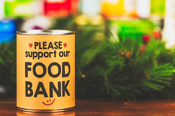 пожалуйста, поддержку наших продуктовый банк. holiday консервы drive - food canned food drive motivation стоковые фото и изображения