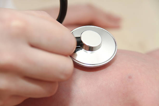 istock Baby gets a lung examination by a nurse with stethoscope 495763266