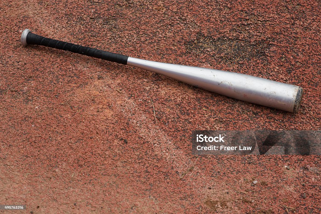 baseball bat on a rubber background Baseball Bat Stock Photo