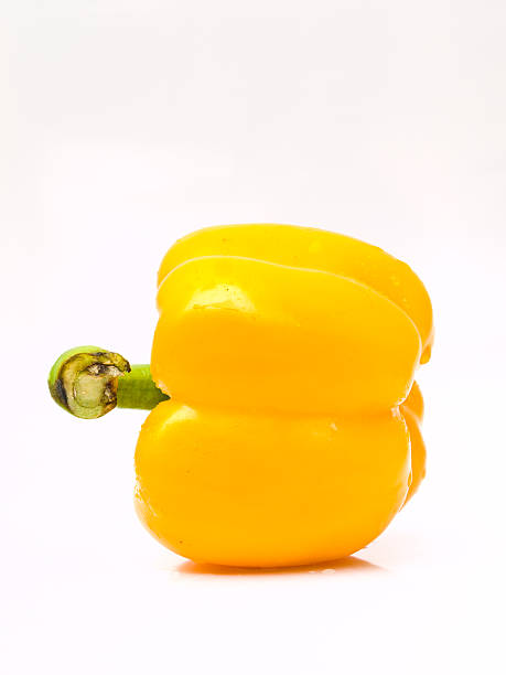 istock Fresh yellow bell pepper isolated on white background 495763381
