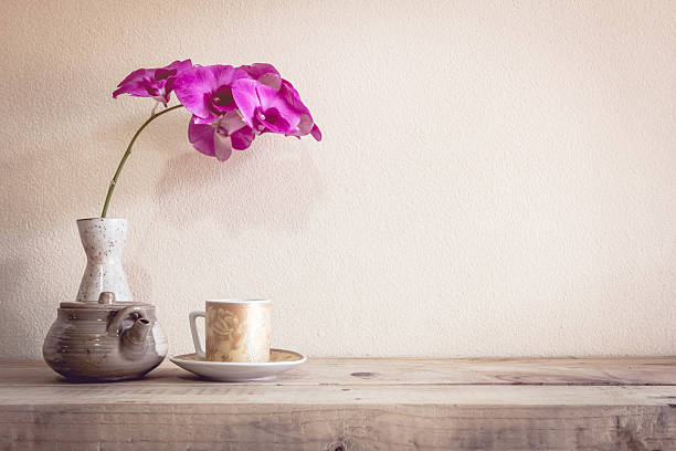 istock Teapot and flower, home decoration concept 495763958