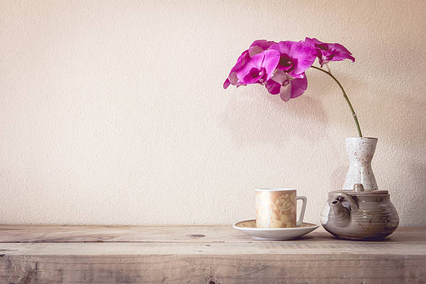 istock Teapot and flower, home decoration concept 495764314