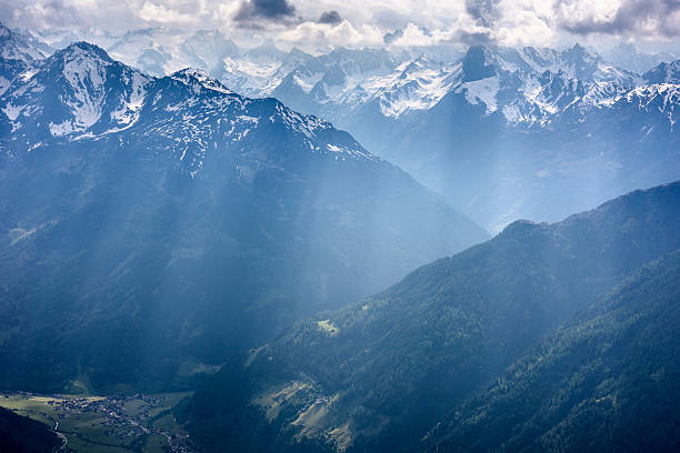 View from the mountain Serles over the Stubai valley in the backlight (Austria, European Alps).