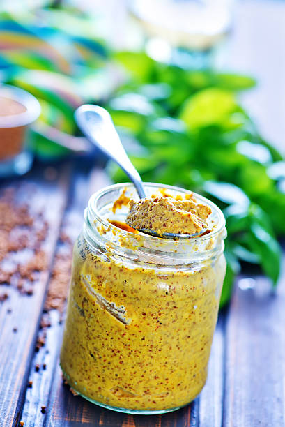 mustard mustard in glass bank and on a table dijonnaise stock pictures, royalty-free photos & images
