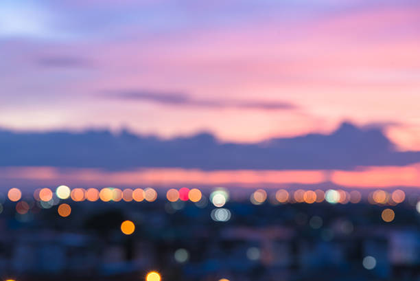 istock Defocused pink sky and city light 495777386