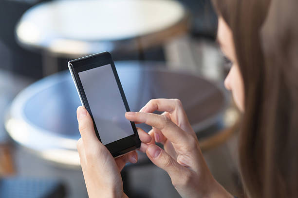 istock woman with smartphone 495779884