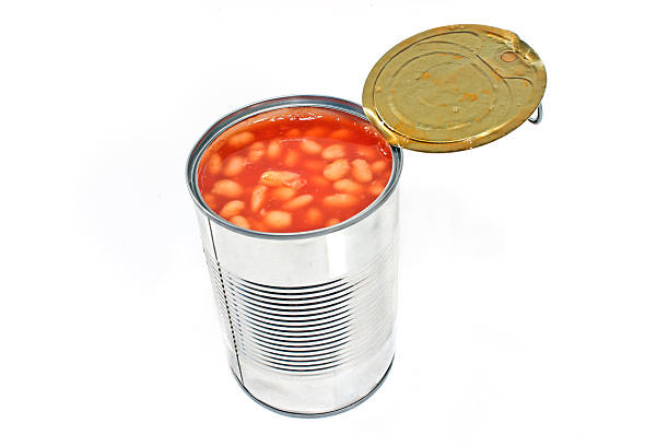 istock Open tin can of beans isolated on white 495781397