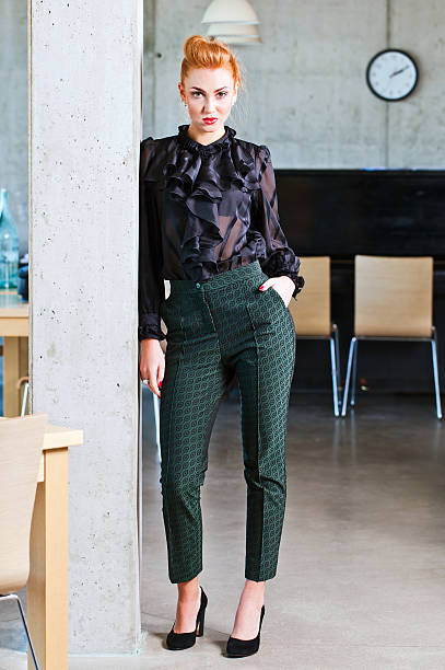 istock young beautiful woman in  black blouse 495782035