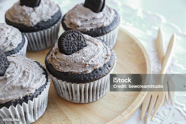 Homemade Dark Chocolate Cupcakes With Cookie And Cream Frosting Stock Photo - Download Image Now