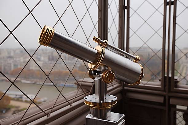 Eiffel Tower Telescope Eiffel Tower telescope on the observation deck low viewing point stock pictures, royalty-free photos & images