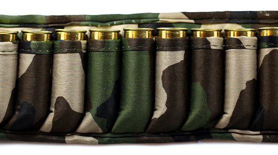 shutgun cartridges in camo belt