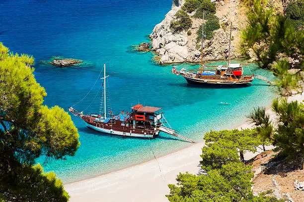 Beautiful Apella beach hidden between high mountains in Karpathos island. Greece.