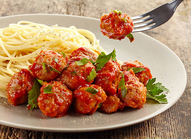 istock Meatballs with tomato sauce and spaghetti 495786471