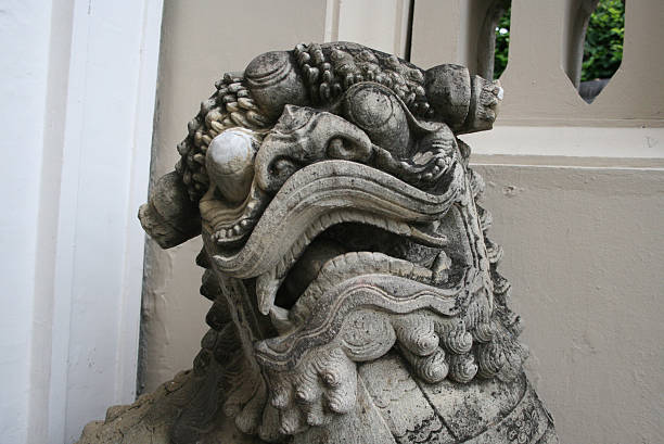 istock Dragon's head made of stone 495786495