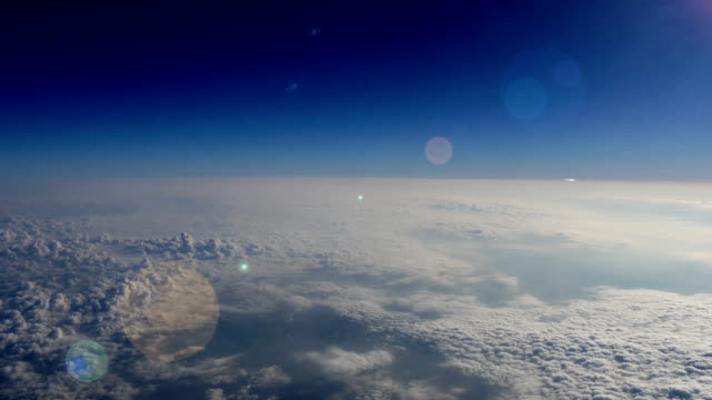 Aerial of Earth's atmosphere with Lens Flare