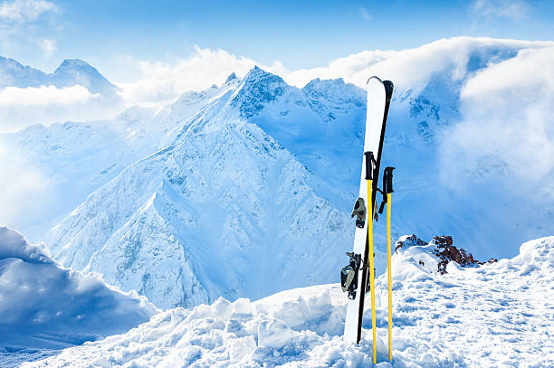 istock Winter mountains and ski equipment in the snow 495797326