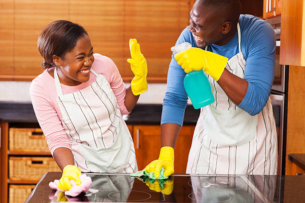 istock african couple having fun while doing household chores 495798598