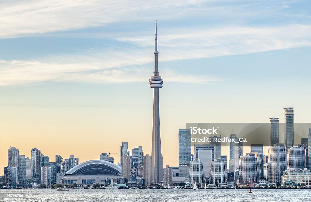 Toronto Skyline with the CN Tower apex at sunset View of Downtown Toronto skyline with the CN Tower and the Financial District skyscrapers at sunset. Toronto Stock Photo