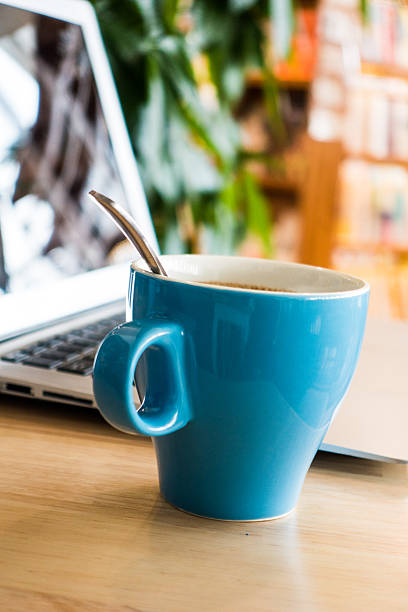 istock Laptop and a cup of coffee on office desk 495799770