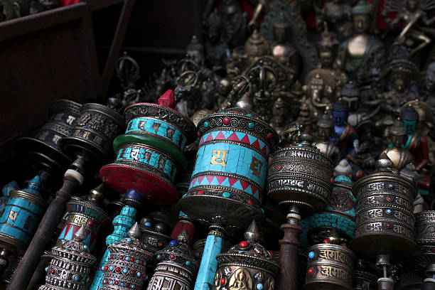 istock Many small Buddhist prayer wheels at the gift shop 495803222