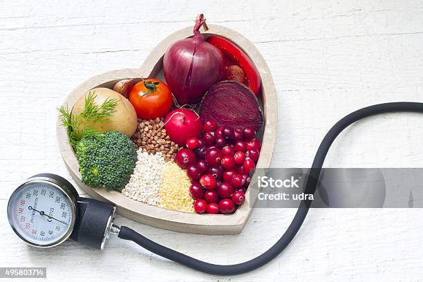 Healthy Food In Heart And Lowering Pressure Sign Concept Stock Photo - Download Image Now