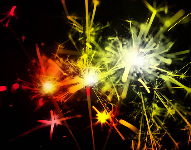 istock red and gold sparklers 495806614