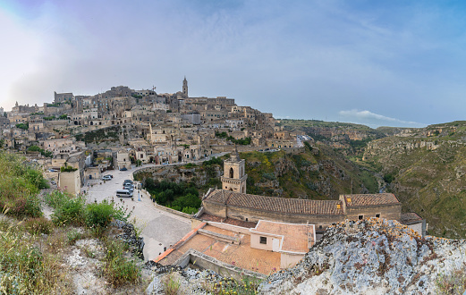Matera, Italy - May 15, 2015: day view of Sassi di Matera ancient town in Matera, Italy. The city is a UNESCO World Heritage site and European Capital of Culture for 2019.