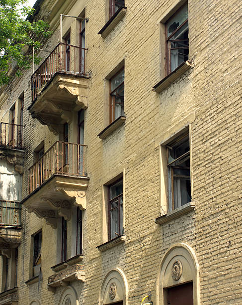 istock Abandoned uninhabited house before renovation side view vertical 495811393