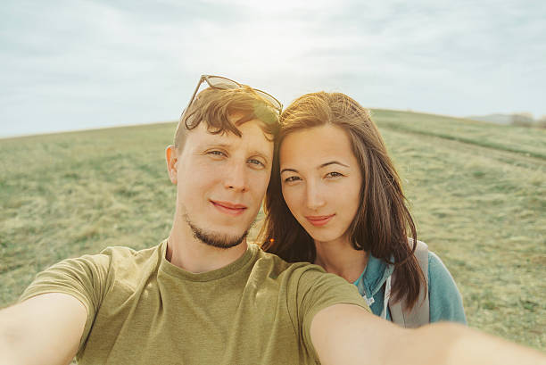 istock Loving couple doing selfie in the mountains 495812170
