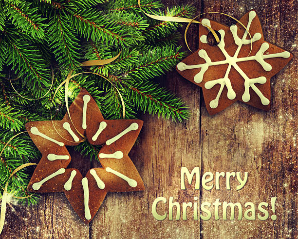 istock Gingerbread cookies over wooden background 495812736
