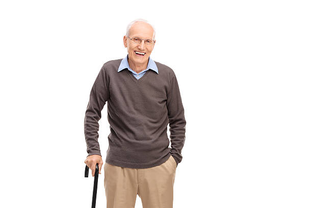 istock Senior man with a cane smiling and posing 495812790