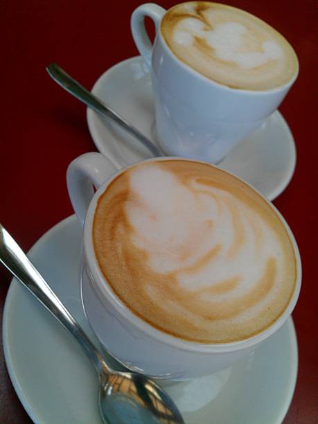istock Cup of art latte or cappuccino coffee 495816063