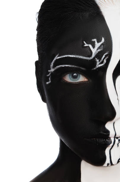 Portrait with black and white colors on face