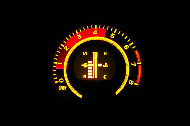 Revving engine tachometer Revving engine yellow tachometer on black background Revving stock pictures, royalty-free photos & images