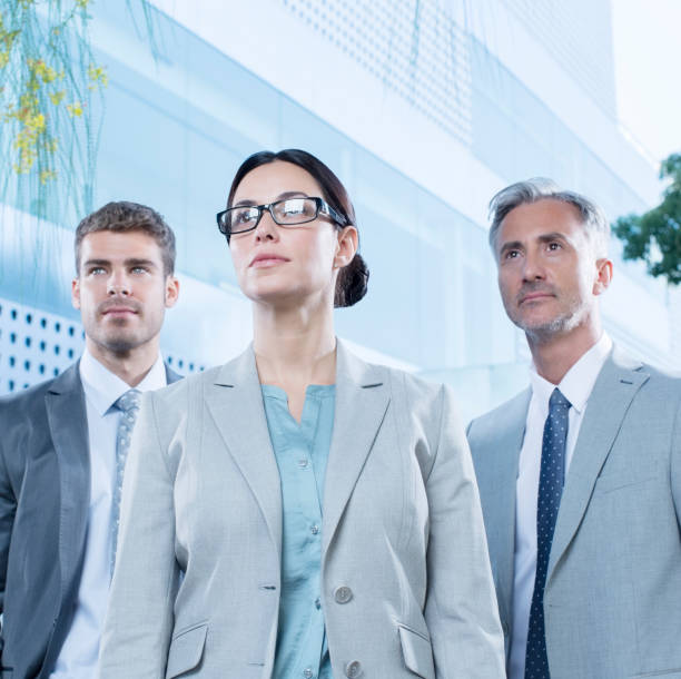 istock Serious business people outdoors 495828269
