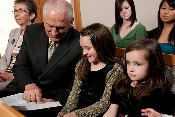 istock Reading a Bible Verse in Church 495829534