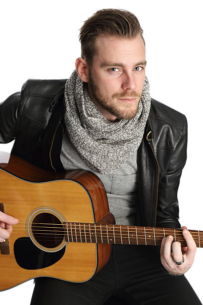 istock Musician sitting down with guitar 495830504