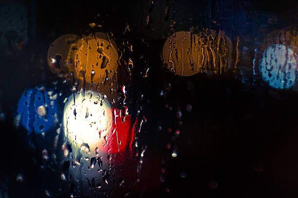 istock Car Headlights and Streetlights in Rain 495831442