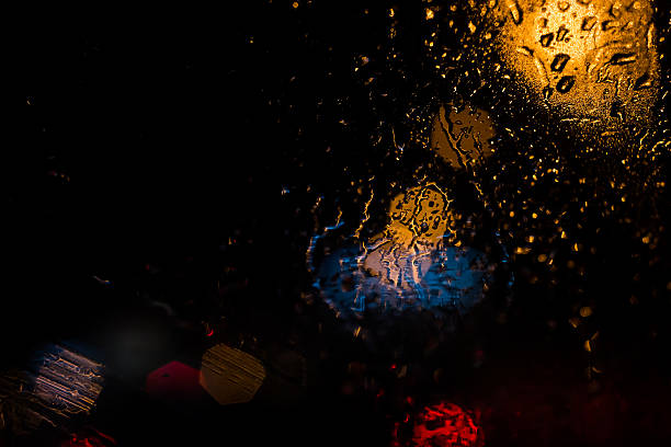 istock Car Headlights and Streetlights in Rain 495832086