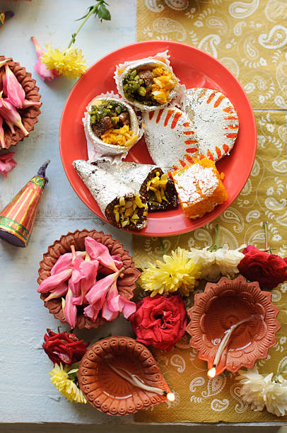 istock Diwali Sweets with Diyas in background 495833388